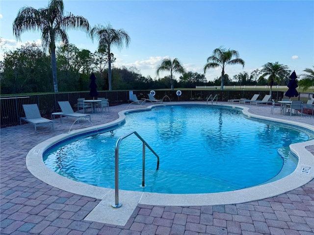 view of pool featuring a patio