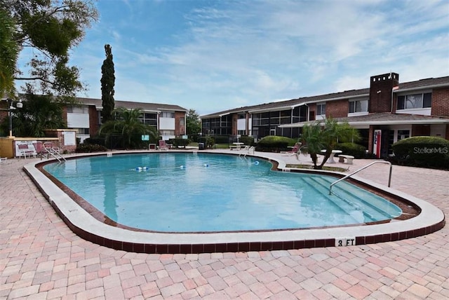 view of pool with a patio area