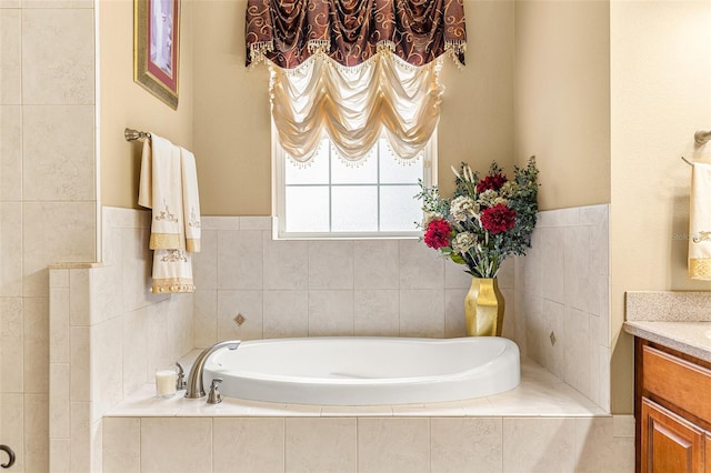 bathroom with a bath and vanity