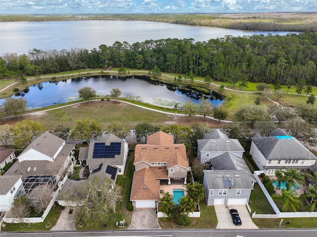 aerial view with a residential view and a water view