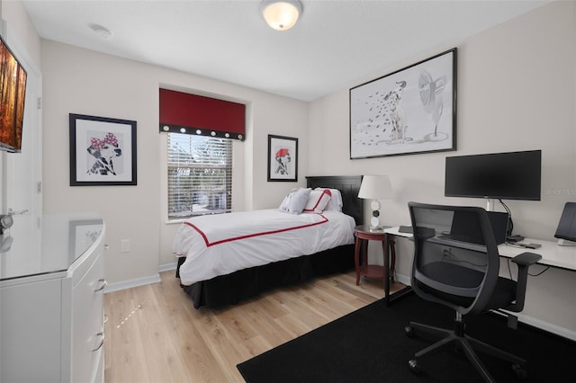 bedroom featuring light hardwood / wood-style floors