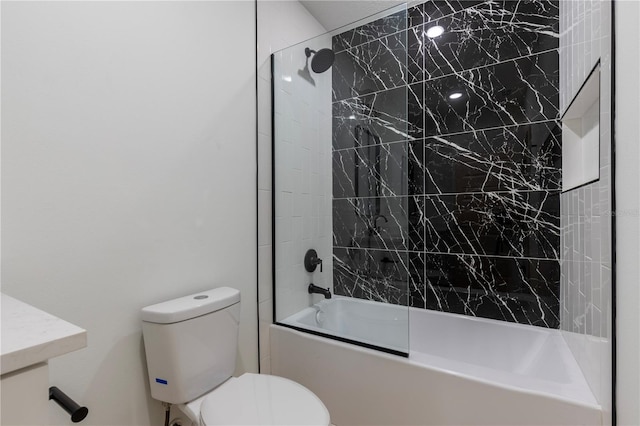 bathroom with vanity, shower / tub combination, and toilet