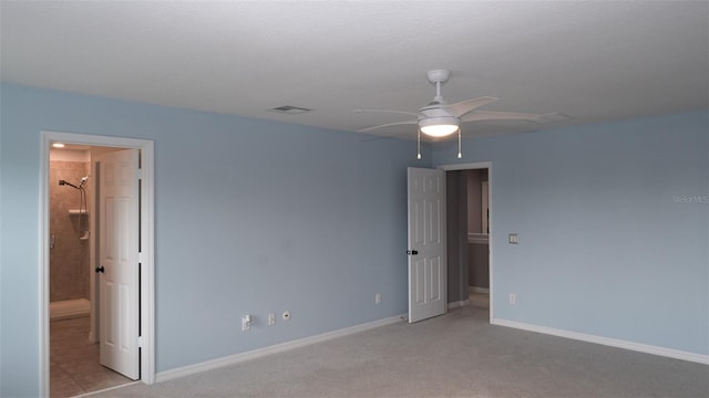 unfurnished bedroom featuring visible vents, baseboards, light carpet, and ceiling fan