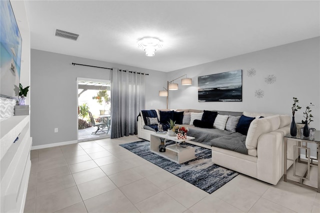 living room featuring light tile patterned floors