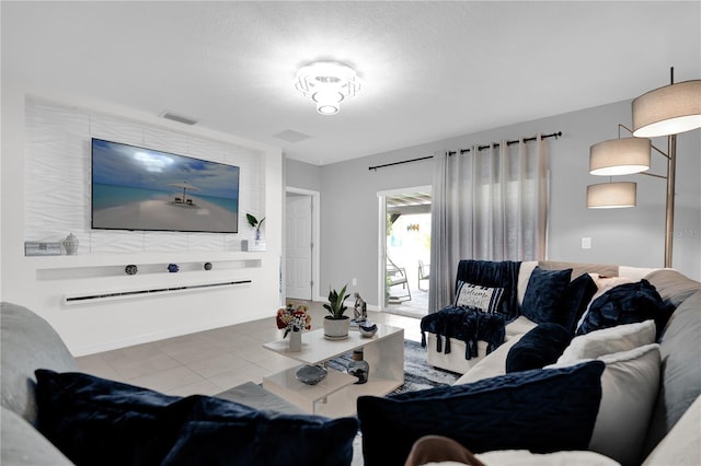 living room featuring light tile patterned floors