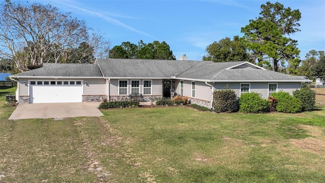 single story home featuring a garage and a front lawn