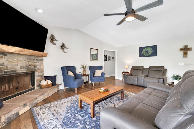 living room with vaulted ceiling, ceiling fan, and hardwood / wood-style floors