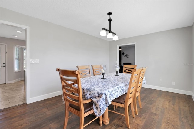 dining room featuring dark hardwood / wood-style flooring