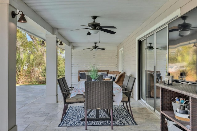 view of patio featuring ceiling fan