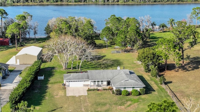 drone / aerial view with a water view