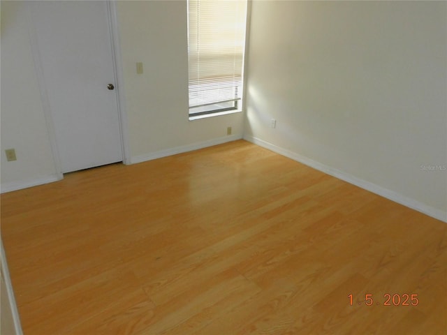 empty room featuring light hardwood / wood-style flooring