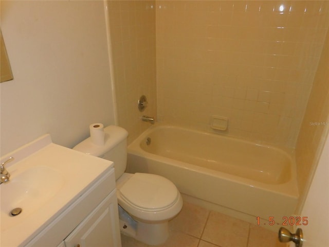 full bathroom featuring tile patterned flooring, shower / washtub combination, vanity, and toilet