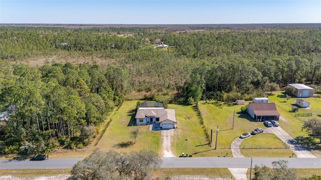 aerial view with a wooded view