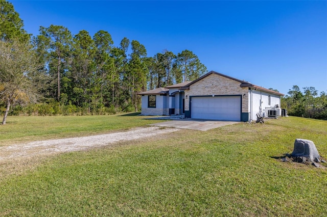 ranch-style house with a garage, central AC, concrete driveway, stone siding, and a front yard