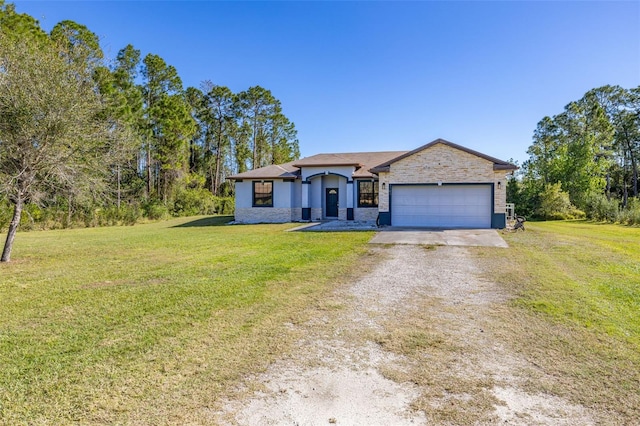 view of front of home with a front yard, driveway, and an attached garage