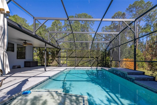 pool with a lanai, a ceiling fan, and a patio