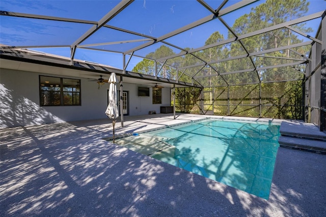 pool with ceiling fan, a patio, and a lanai