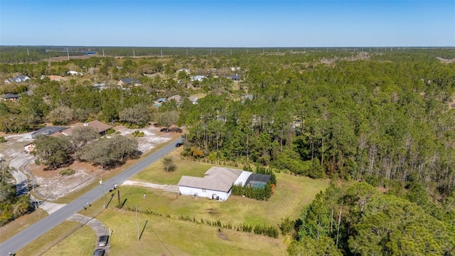 aerial view with a wooded view