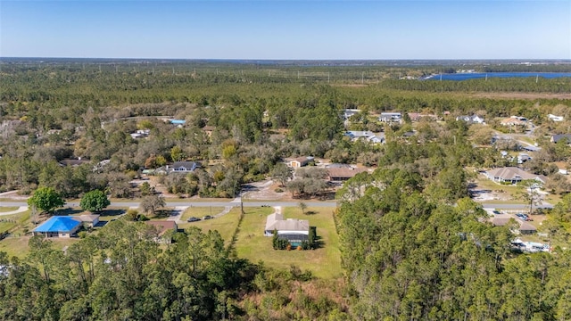 bird's eye view featuring a view of trees