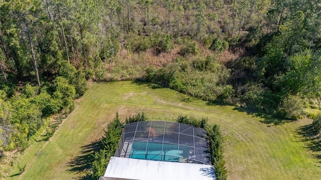 aerial view with a wooded view