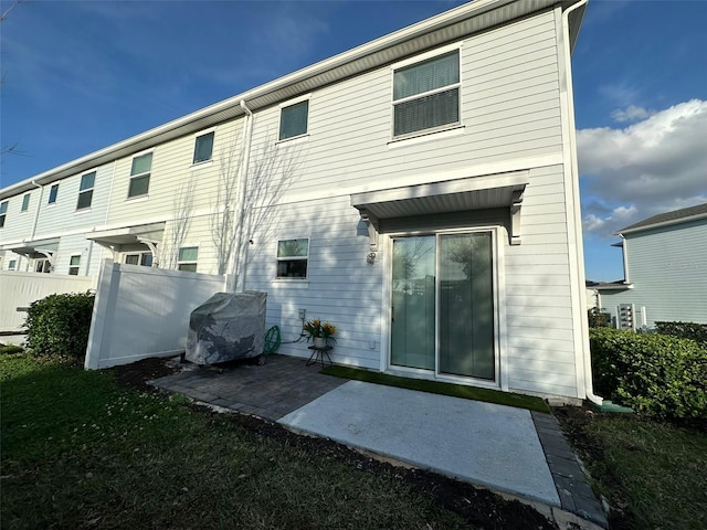 back of house featuring a patio area