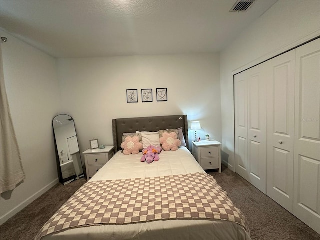 carpeted bedroom featuring a closet