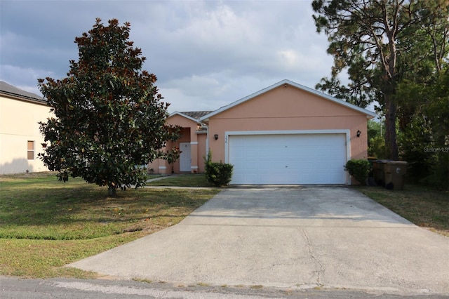 350 Chelmsford Ct, Kissimmee, FL 34758 - view of front of property featuring stucco siding, driveway, a front lawn, and an attached garage