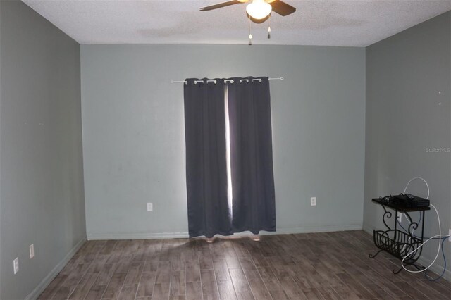 350 Chelmsford Ct, Kissimmee, FL 34758 - unfurnished room featuring a ceiling fan, wood finished floors, and a textured ceiling