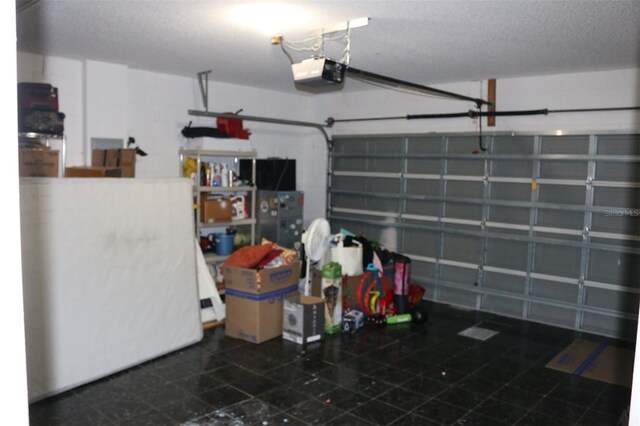 350 Chelmsford Ct, Kissimmee, FL 34758 - garage with a garage door opener