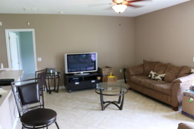 350 Chelmsford Ct, Kissimmee, FL 34758 - living area with a ceiling fan and light tile patterned floors