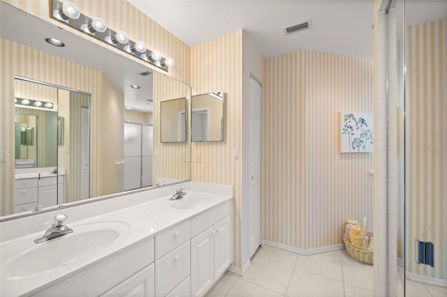 bathroom featuring vanity and tile patterned floors