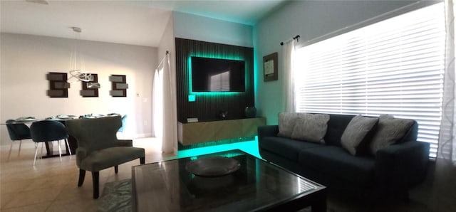 living room with tile patterned floors