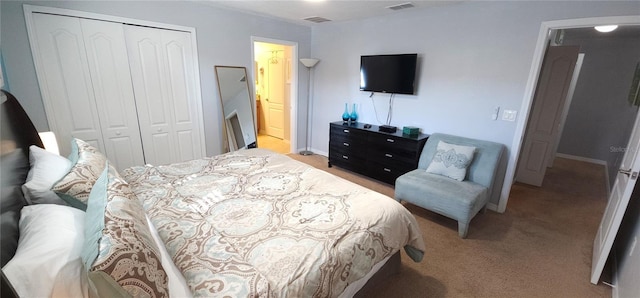 carpeted bedroom featuring a closet