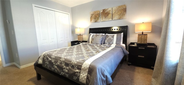 carpeted bedroom featuring a closet