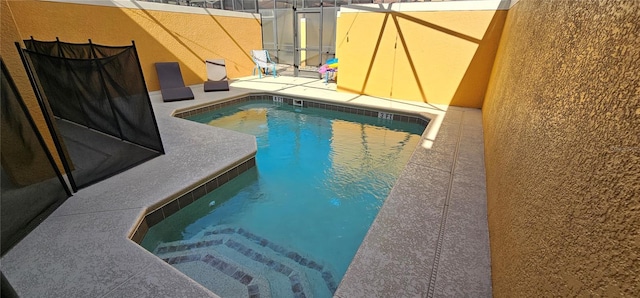 view of pool featuring a patio