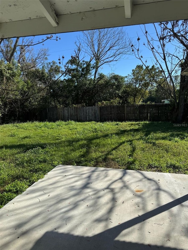 view of yard with a patio area and fence