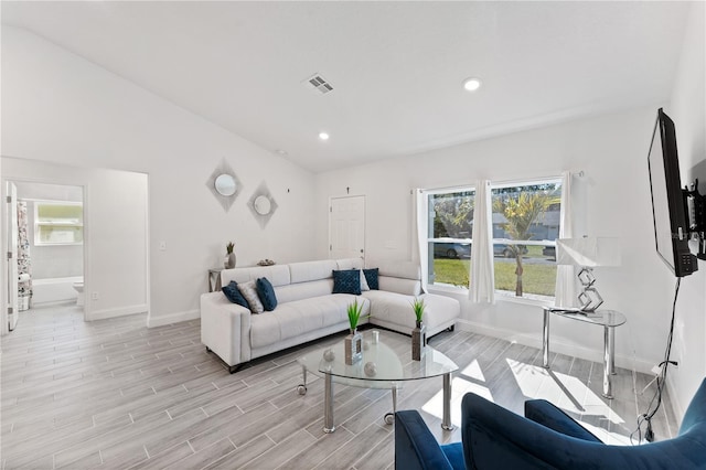 living room featuring a wealth of natural light