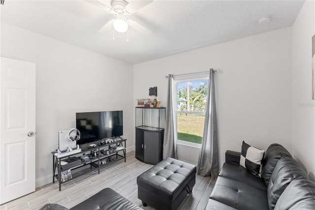 living room with ceiling fan