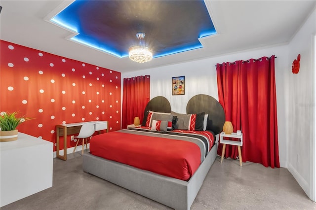 bedroom featuring an inviting chandelier and concrete flooring