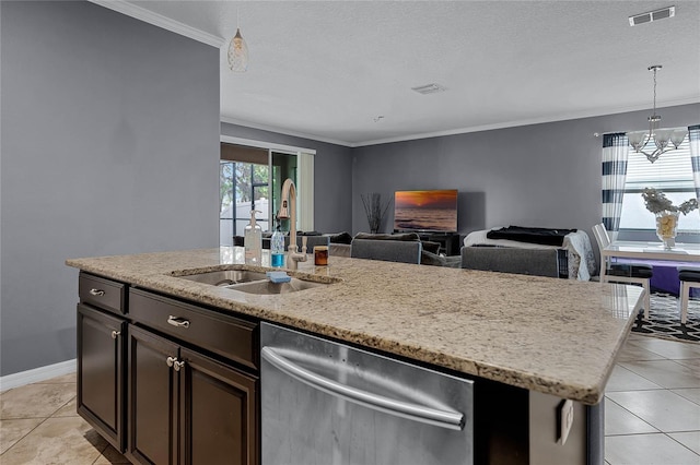 kitchen featuring sink, dark brown cabinets, hanging light fixtures, dishwasher, and light stone countertops