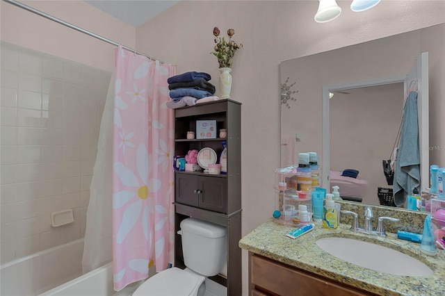 full bathroom featuring vanity, shower / tub combo with curtain, and toilet