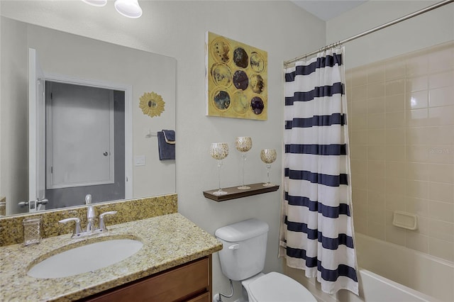 full bathroom featuring vanity, toilet, and shower / bathtub combination with curtain