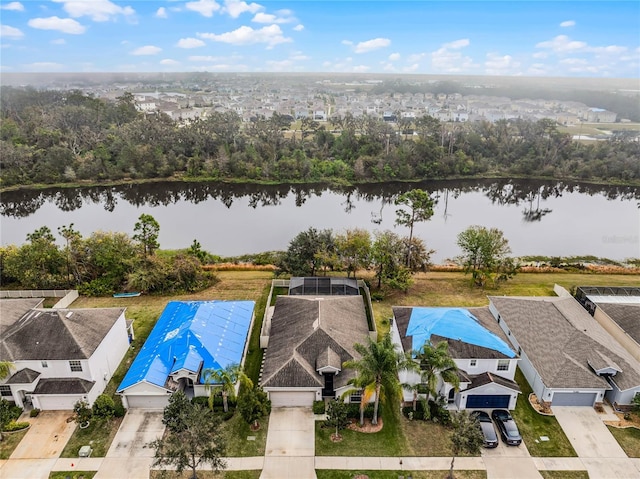 birds eye view of property featuring a water view