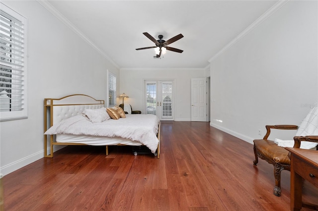 bedroom with dark wood-type flooring, french doors, crown molding, ceiling fan, and access to exterior