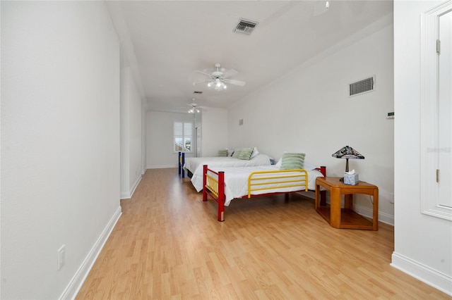 bedroom featuring ceiling fan and light wood-type flooring