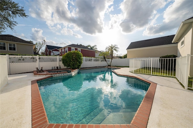 view of swimming pool with a patio area