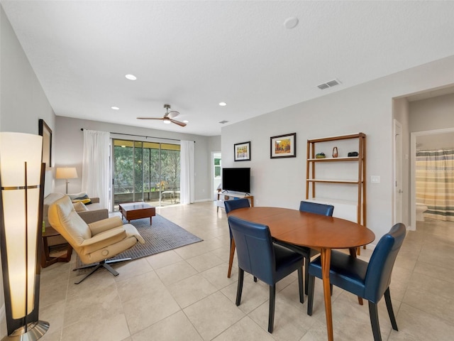 dining area featuring light tile patterned floors, ceiling fan, visible vents, and recessed lighting