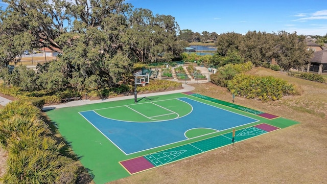 view of sport court featuring a water view and community basketball court