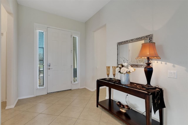 entrance foyer featuring light tile patterned flooring