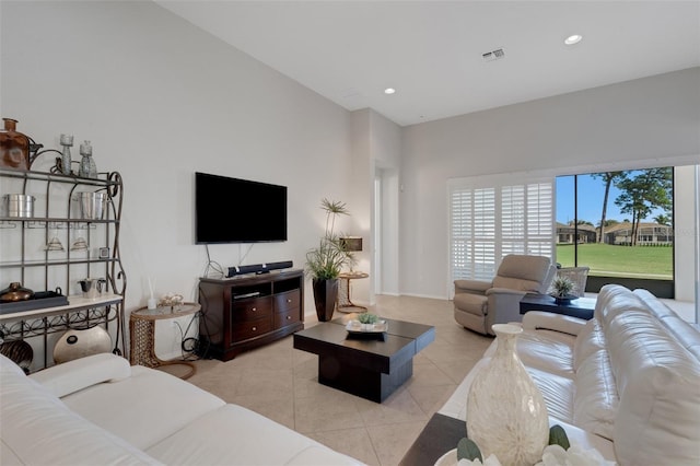 living room featuring light tile patterned flooring